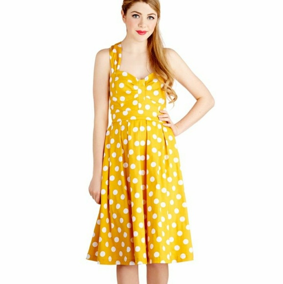 yellow and white polka dot dress